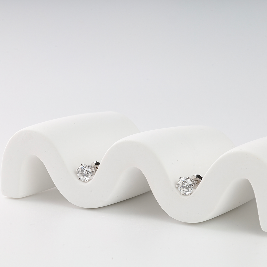 Side view of lab-grown diamond stud earring in 14K white gold screw-back setting