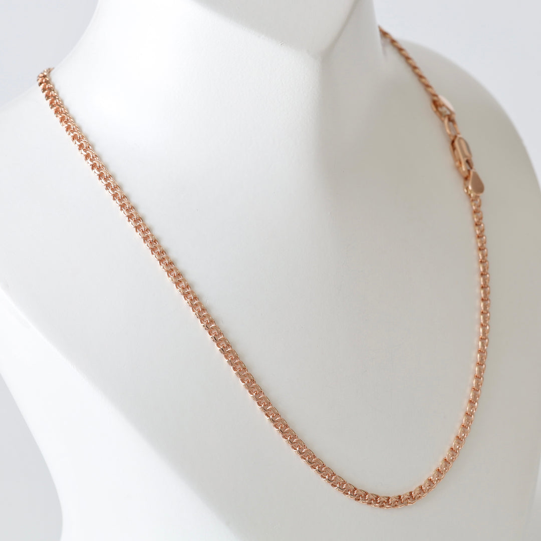 Rose gold chain necklace with box links displayed on a white bust for jewelry, chain necklace, rose gold.