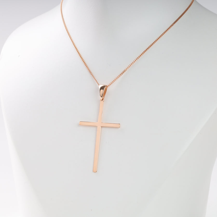 Rose gold cross pendant necklace with a thin box chain displayed on a white mannequin bust.
