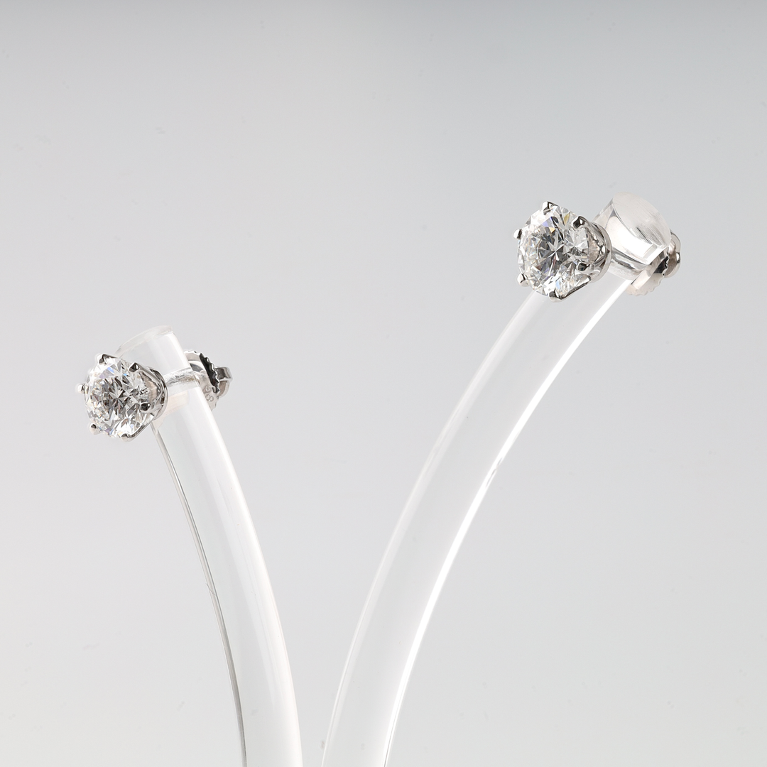 Close-up of 2.11 ct total lab-grown diamond earrings in white gold