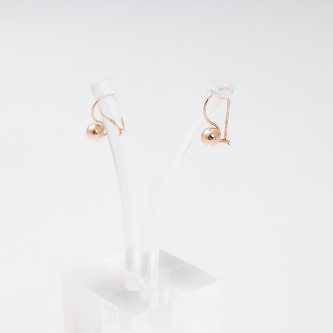 14k gold ball drop earrings on clear stand, minimalist dangle Ukrainian Jewelry, simple gold earrings for women.