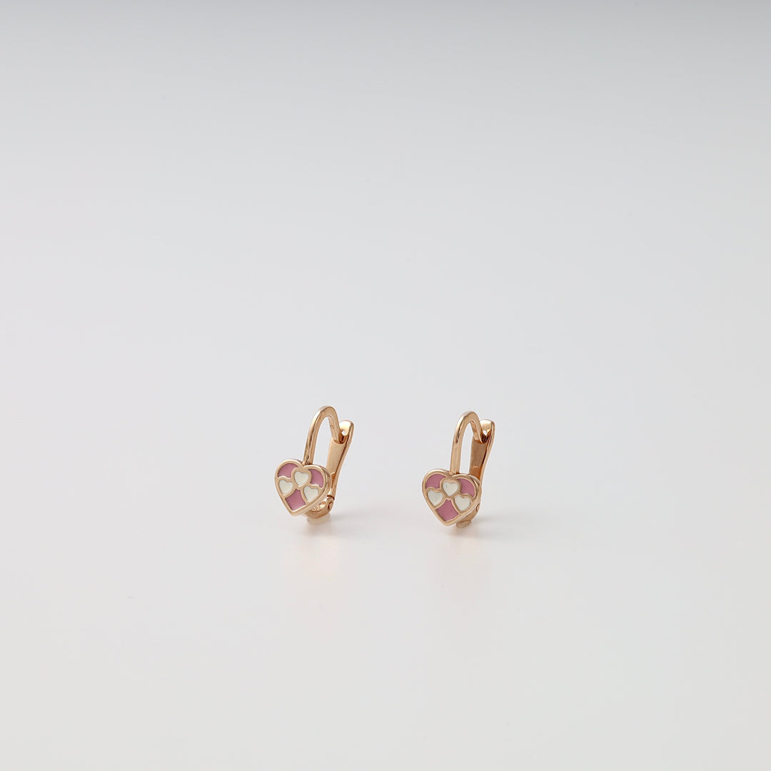 14k gold heart huggie earrings with pink and white enamel hearts on white background, Ukrainian Jewelry, kids gold earrings gift.