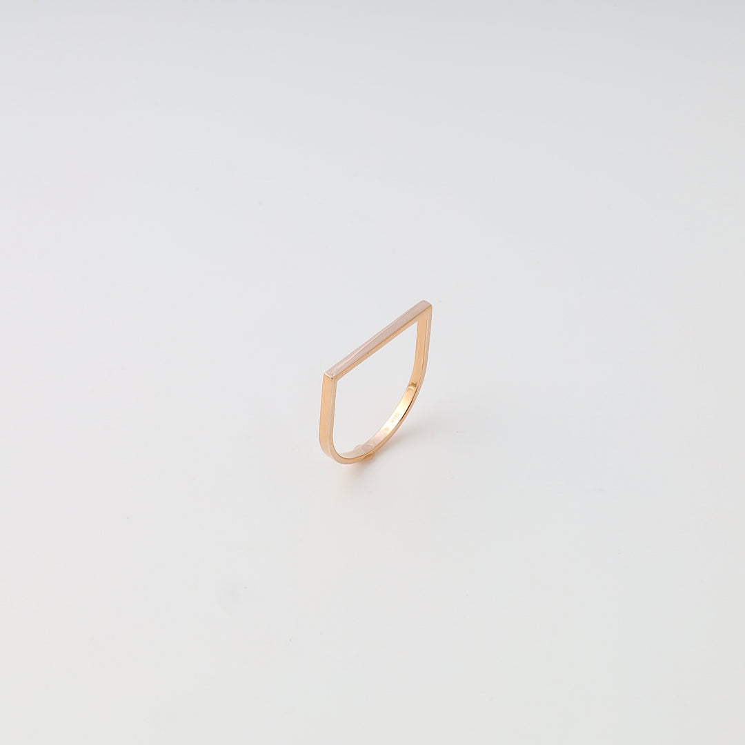 Minimalist 14k gold geometric bar ring on white background, modern stackable band, Ukrainian Jewelry for women.