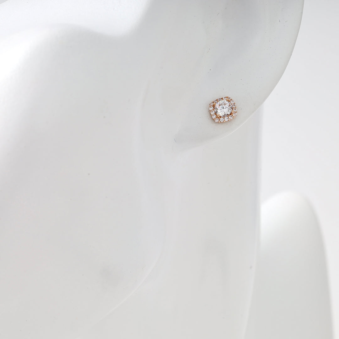 14k gold square halo stud earring with clear stones on ear display, Ukrainian Jewelry, dainty gold stud, diamond look earrings.