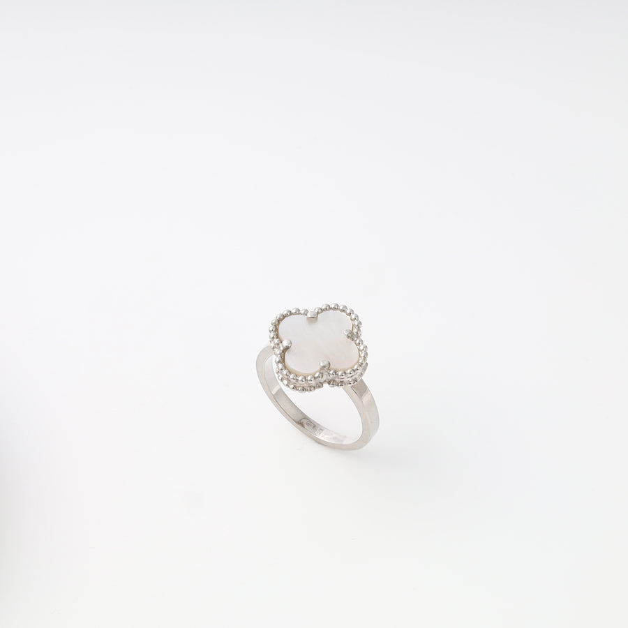 Sterling silver ring with white mother of pearl clover motif on white background, Ukrainian Jewelry, minimalist silver fashion ring.