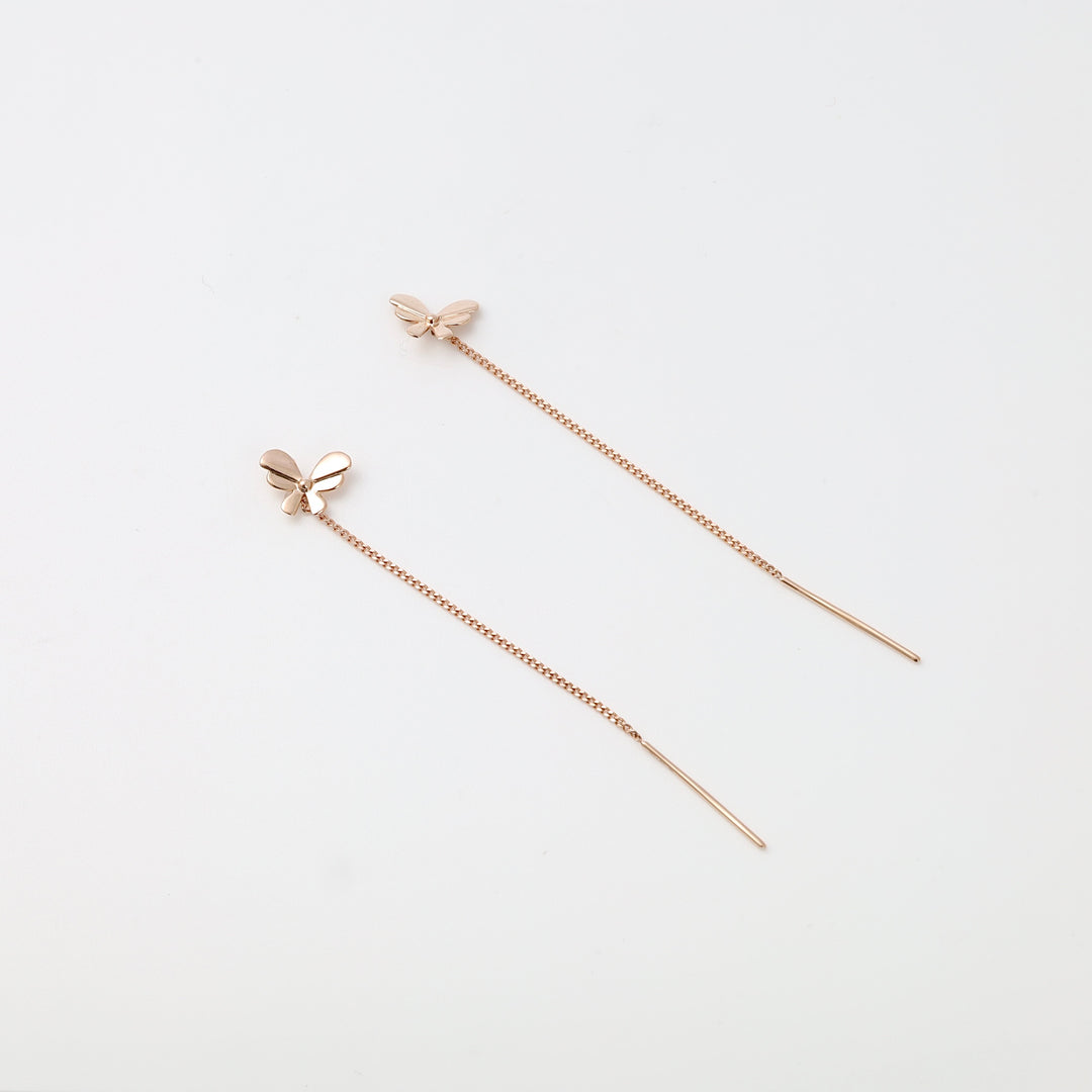 14k gold threader earrings with small butterfly charms displayed on white background, Ukrainian Jewelry, dainty gold drop earrings.