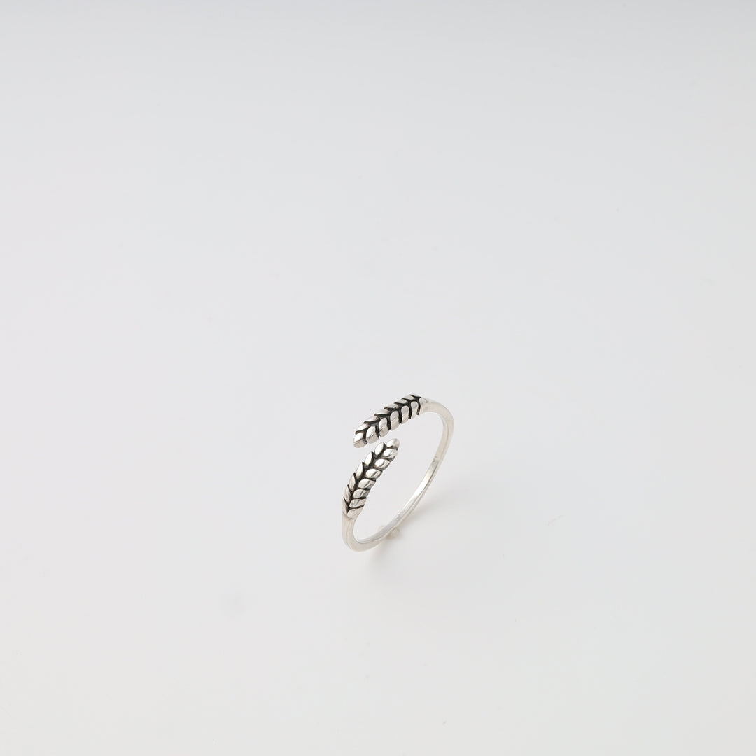 Sterling silver open wheat ring on white background, minimalist adjustable band, Ukrainian Jewelry, silver ring gift.