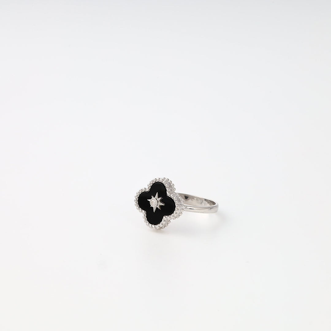 Sterling silver ring with black clover enamel and center stone on white background, Ukrainian Jewelry, silver statement ring.