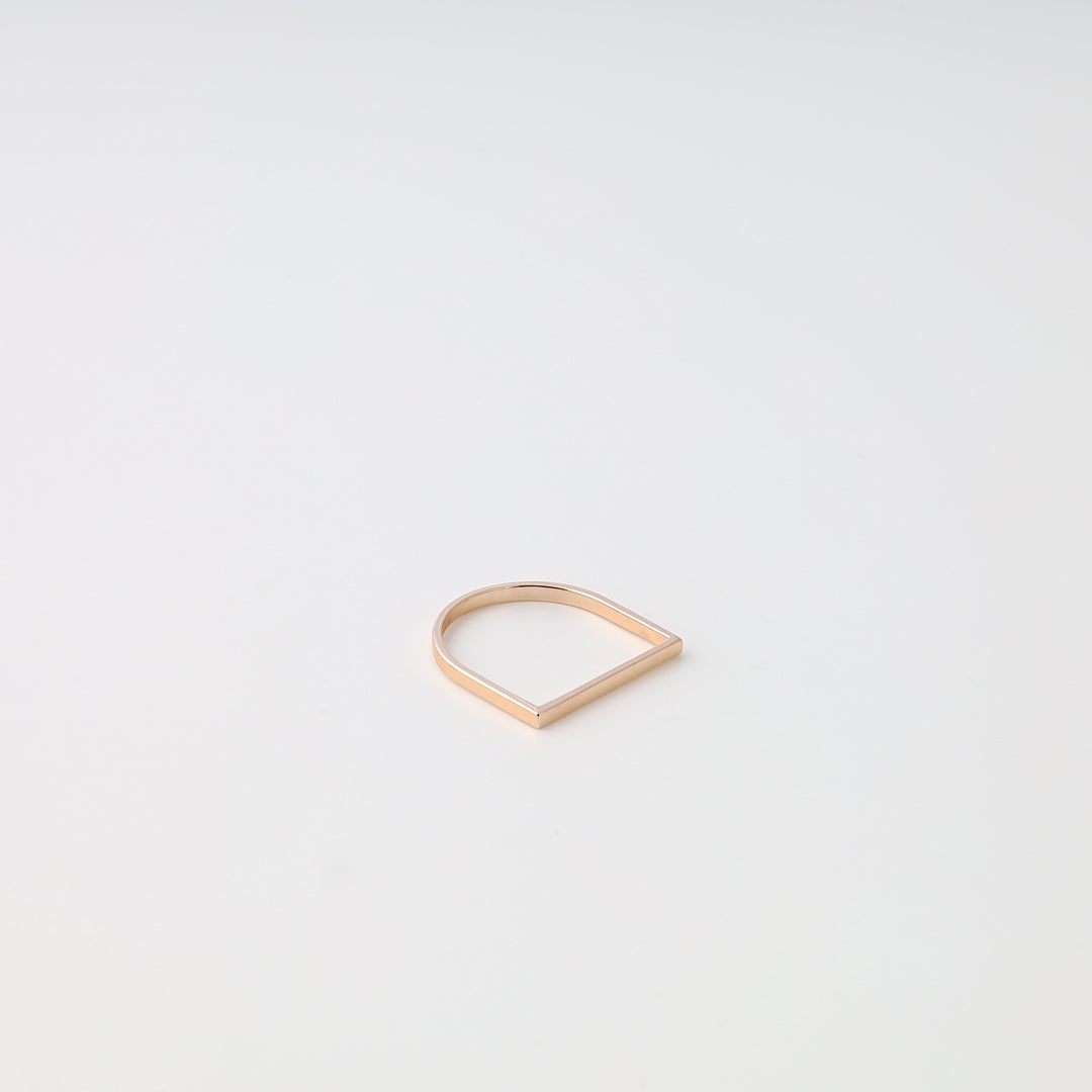 Minimalist 14k gold geometric open band ring on white background, modern stackable Ukrainian Jewelry for everyday wear.