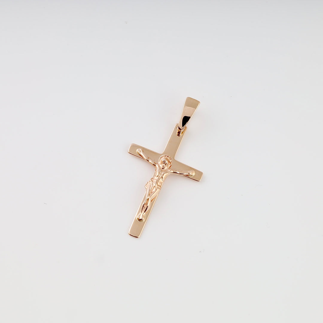 14k gold crucifix pendant with Jesus figure on plain white background, classic cross necklace Ukrainian Jewelry for religious gift.