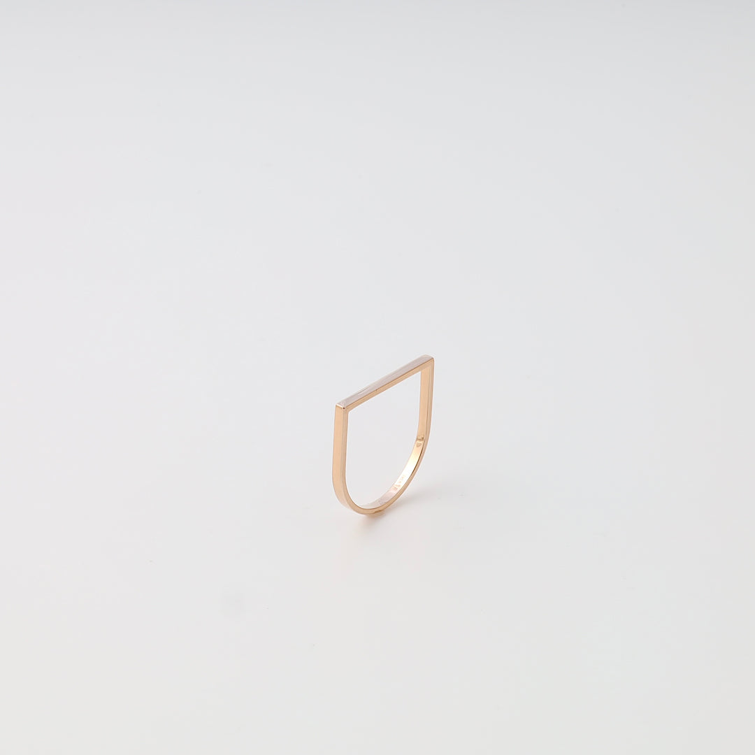 Minimalist 14k gold geometric ring on white background, modern stacking ring style, Ukrainian Jewelry for everyday wear.