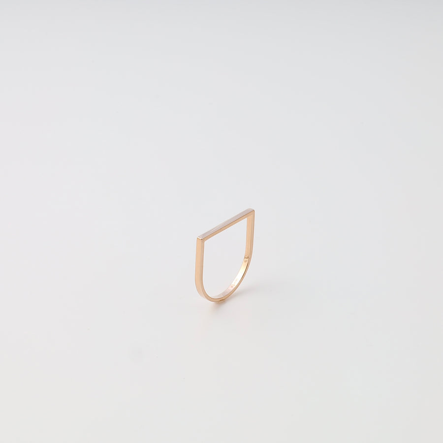 Minimalist 14k gold geometric ring on white background, modern stacking ring style, Ukrainian Jewelry for everyday wear.