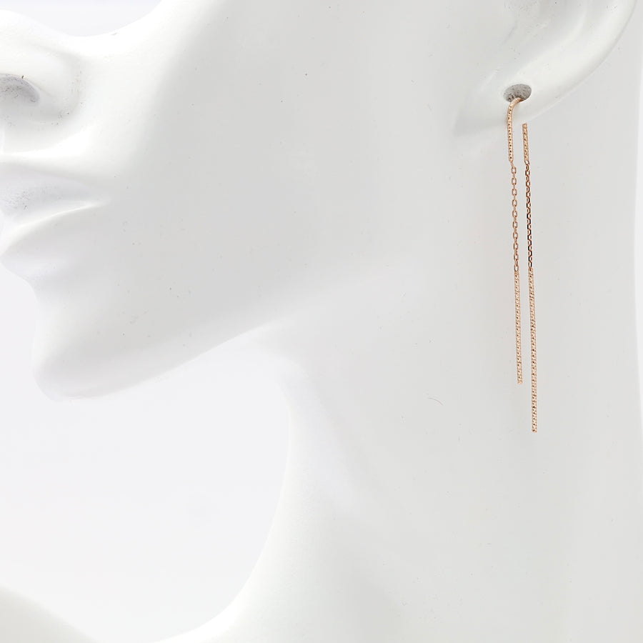 14k gold threader chain drop earring displayed on ear mannequin, minimalist dangle Ukrainian Jewelry for women.