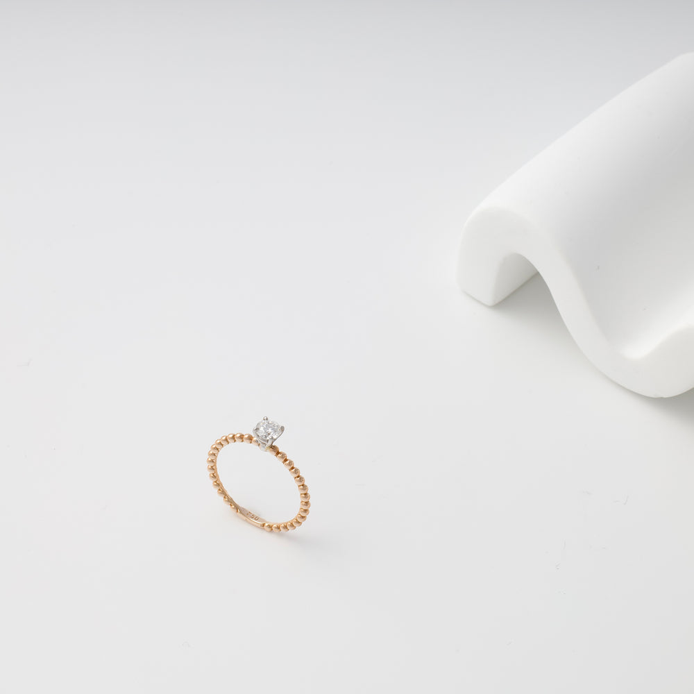 Delicate 14k gold beaded engagement ring with solitaire diamond on white background, Ukrainian Jewelry, gold engagement ring.