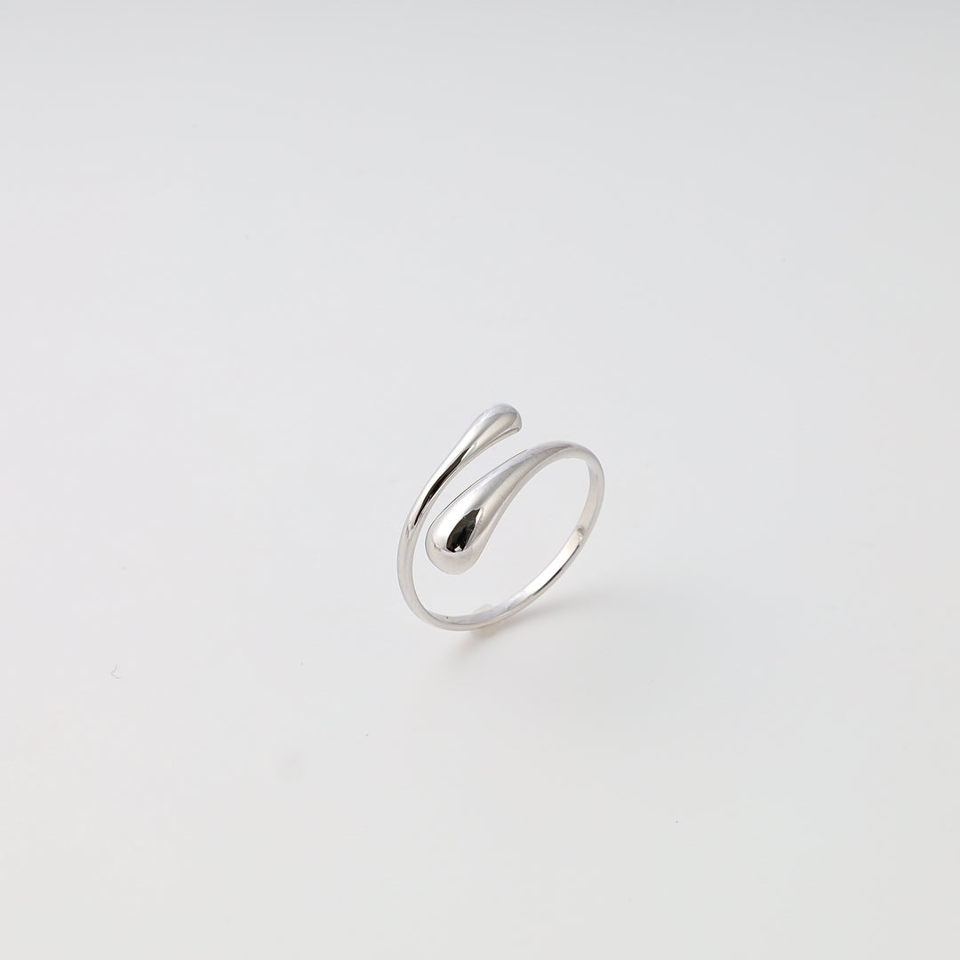 Sterling silver open swirl ring on white background, minimalist adjustable band, Ukrainian Jewelry, modern silver ring gift.