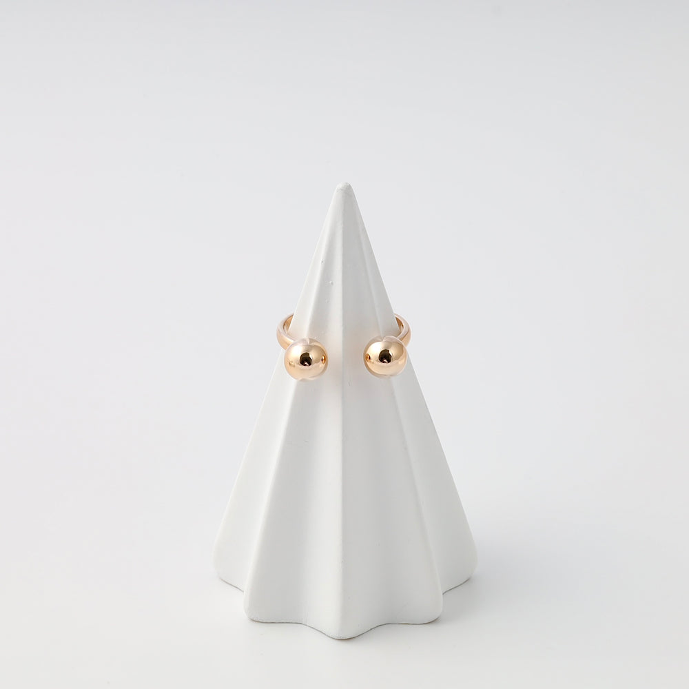 Minimalist 14k gold ball stud earrings on white display cone, Ukrainian Jewelry, simple gold stud earrings for everyday wear.