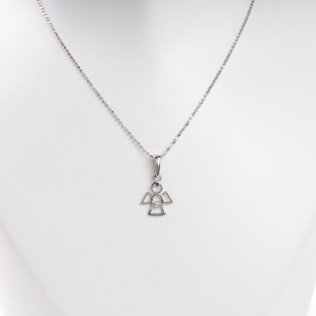 Silver angel pendant necklace with a delicate chain and small clear stone, displayed on a white mannequin bust.