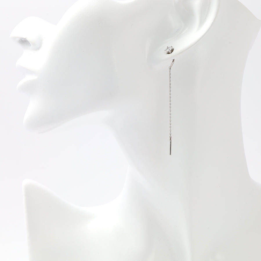 Single sterling silver threader earring with long chain bar drop on mannequin display, minimalist Ukrainian Jewelry for women.