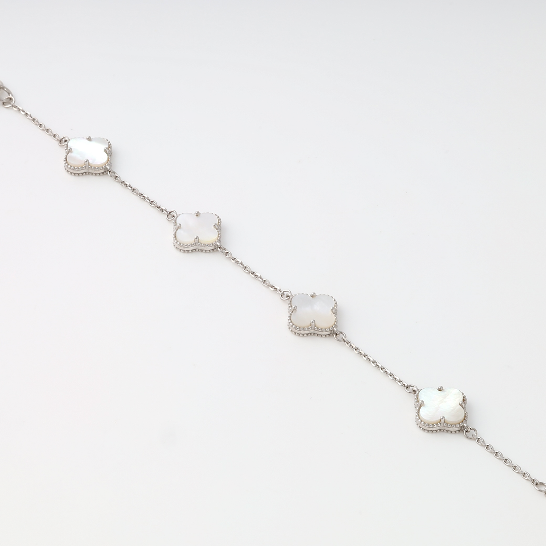 Sterling silver bracelet with four white clover charms, Ukrainian Jewelry, delicate silver chain, mother of pearl clover bracelet.