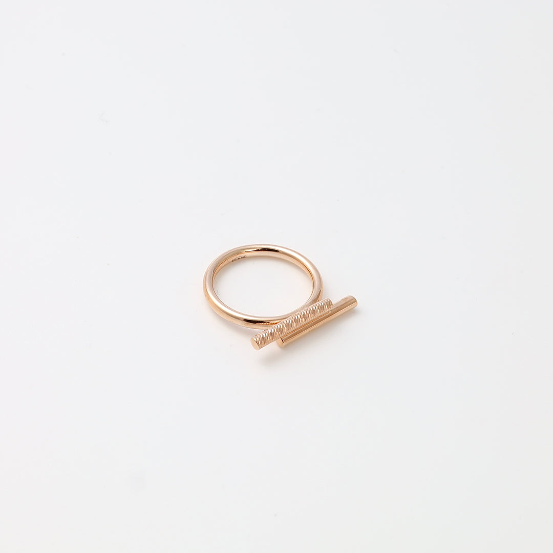 Minimalist 14k gold ring with horizontal bar detail on white background, modern stacking ring Ukrainian Jewelry.