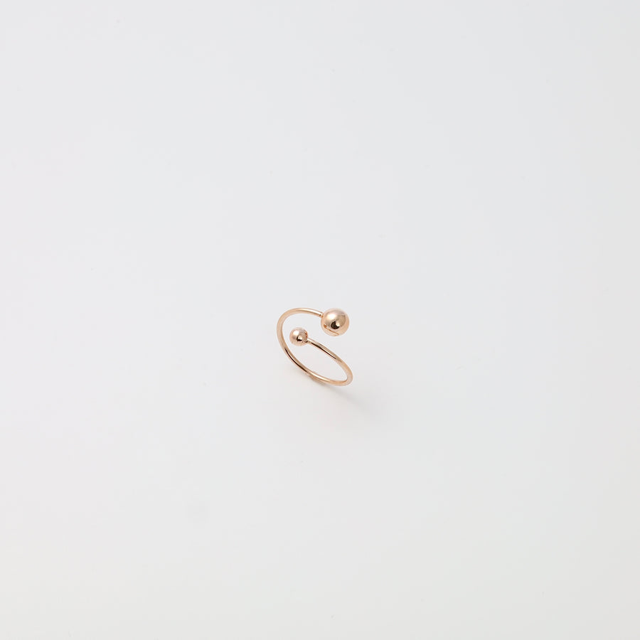 Minimalist 14k gold open ring with two ball ends on white background, modern stackable Ukrainian Jewelry, dainty gold ring.