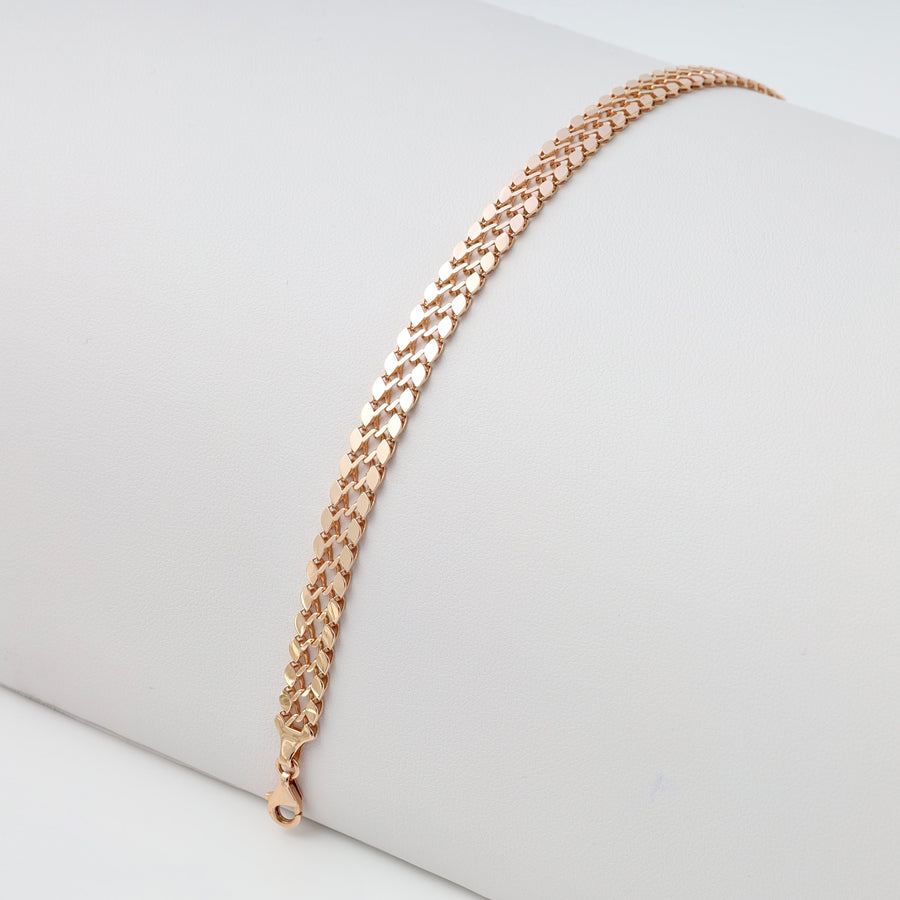 Polished 14k gold chain bracelet with flat links and lobster clasp on display, Ukrainian Jewelry, ideal gold chain bracelet gift.