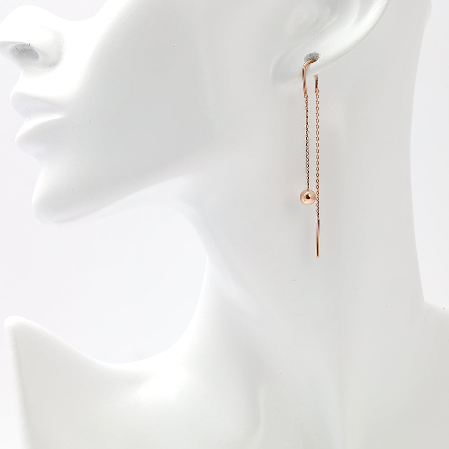 Rose gold threader earring with chain and bead detail in 14k gold, displayed on ear mannequin, modern Ukrainian Jewelry for women.
