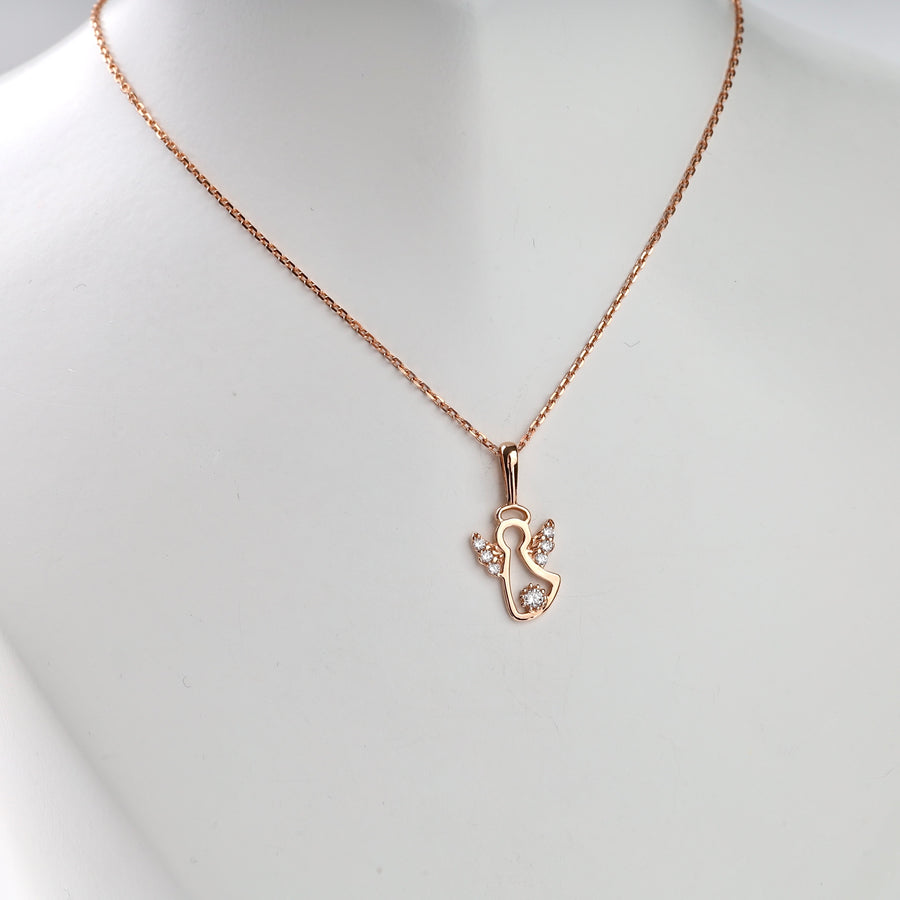 Rose gold angel pendant necklace with clear rhinestones on a mannequin display.