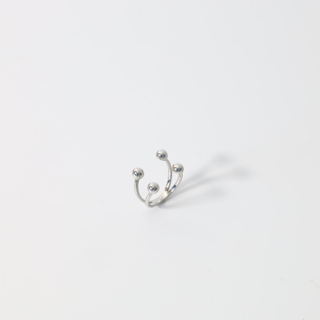 Sterling silver open ring with double band and round ball ends on white background, minimalist Ukrainian Jewelry, adjustable silver ring.