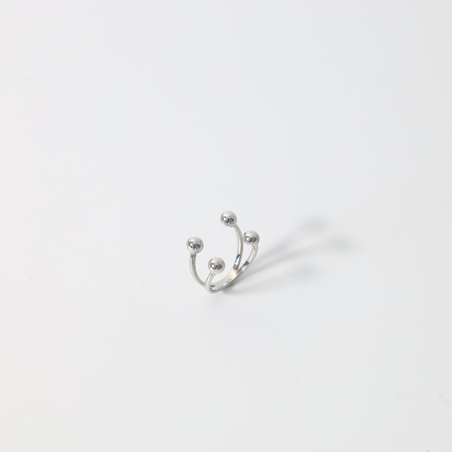 Sterling silver open ring with double band and round ball ends on white background, minimalist Ukrainian Jewelry, adjustable silver ring.