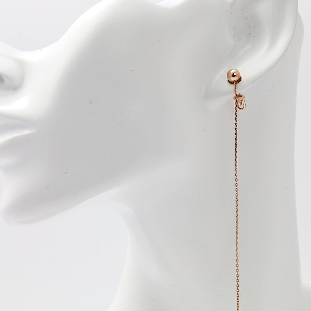 Single 14k gold threader earring with long chain drop on ear mannequin, minimalist dangle Ukrainian Jewelry for women.