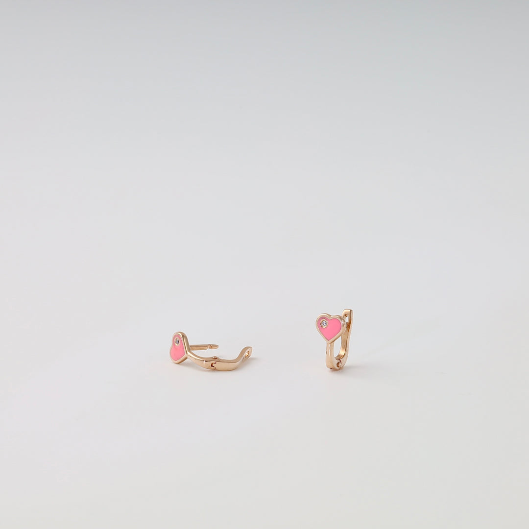 14k gold kids hoop earrings with pink heart charms and tiny stones, displayed on white background, Ukrainian Jewelry gift earrings.