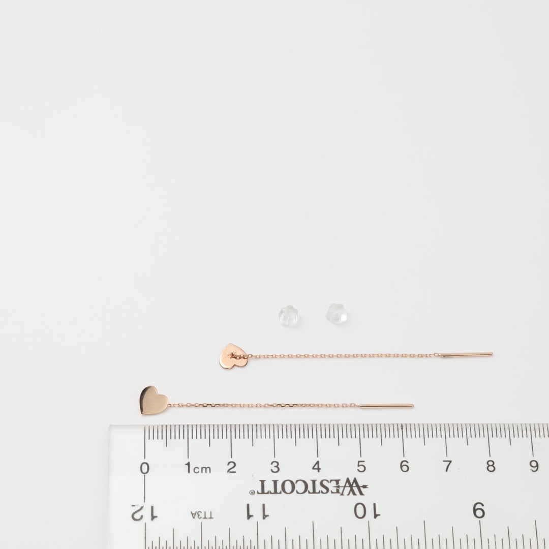 14k gold heart threader earrings with clear studs on white background, Ukrainian Jewelry, delicate gold chain dangle earring set.