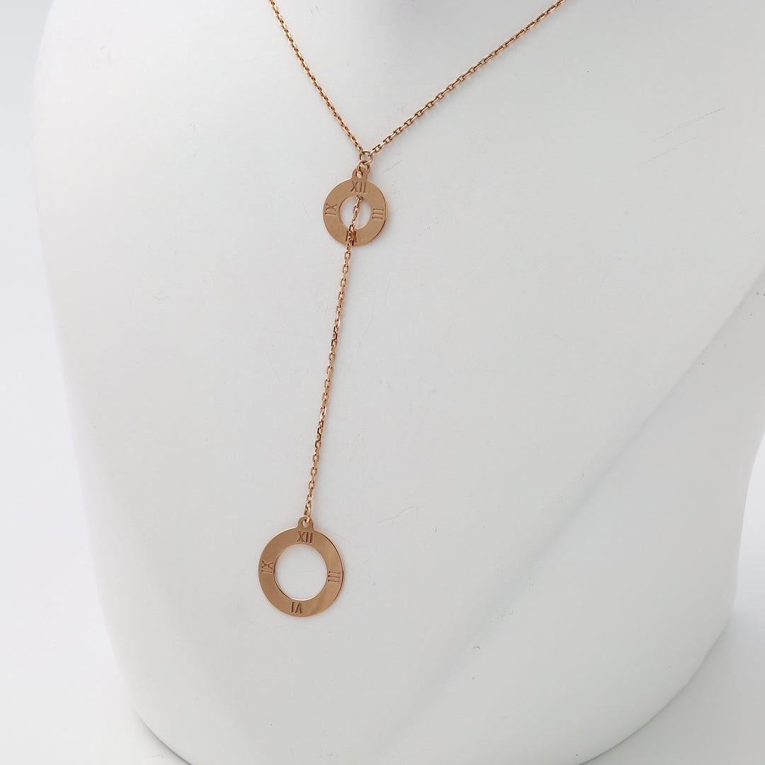 Rose gold necklace with two linked circle pendants and Roman numerals, 14k gold lariat Ukrainian Jewelry, minimalist gold pendant necklace.