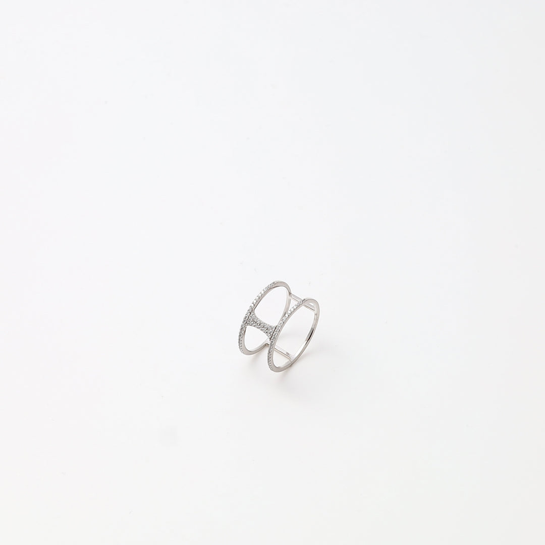 Sterling silver open band ring with pavé stones on a white background, minimalist Ukrainian Jewelry, silver fashion ring.