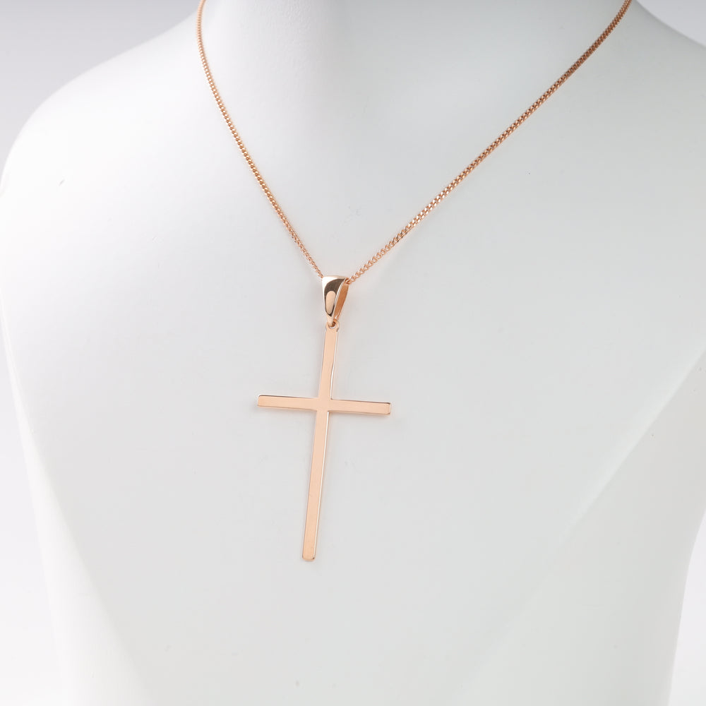 Rose gold cross pendant necklace with a thin box chain displayed on a white mannequin bust.