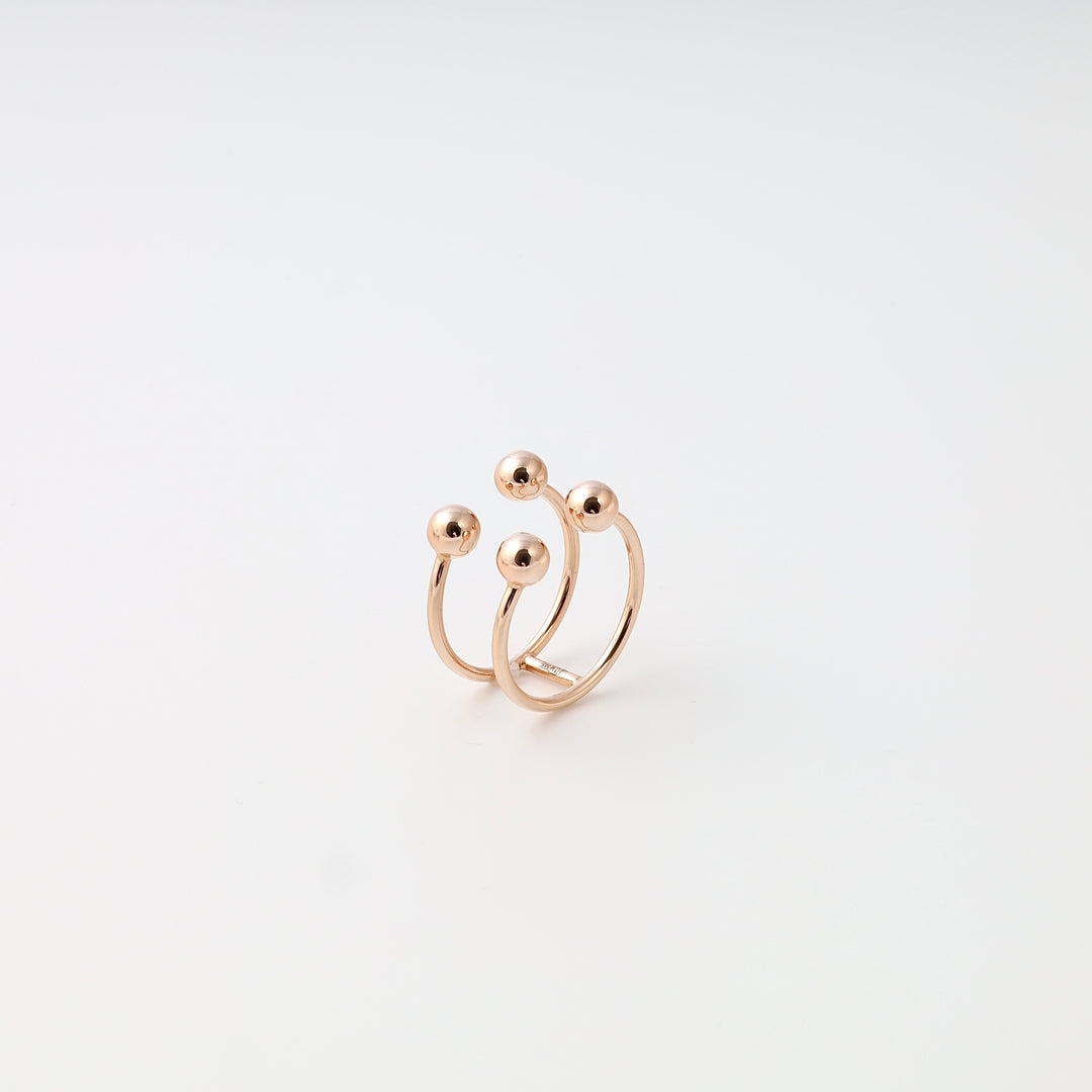 Rose gold ring with three open bands and ball ends, minimalist 14k gold ring, Ukrainian Jewelry for modern stacking ring shoppers.