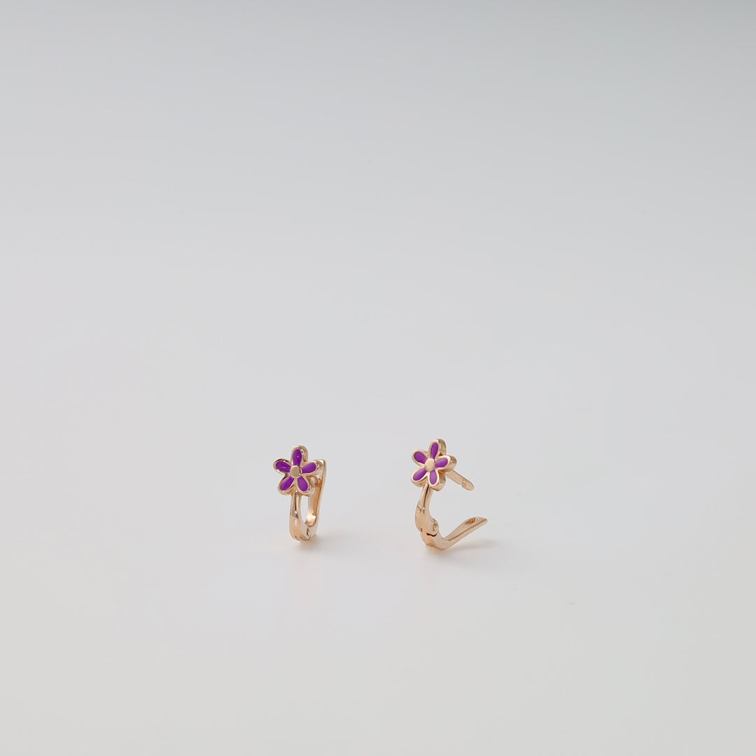 14k gold kids hoop earrings with purple enamel flower design, displayed on white background, Ukrainian Jewelry floral earrings.