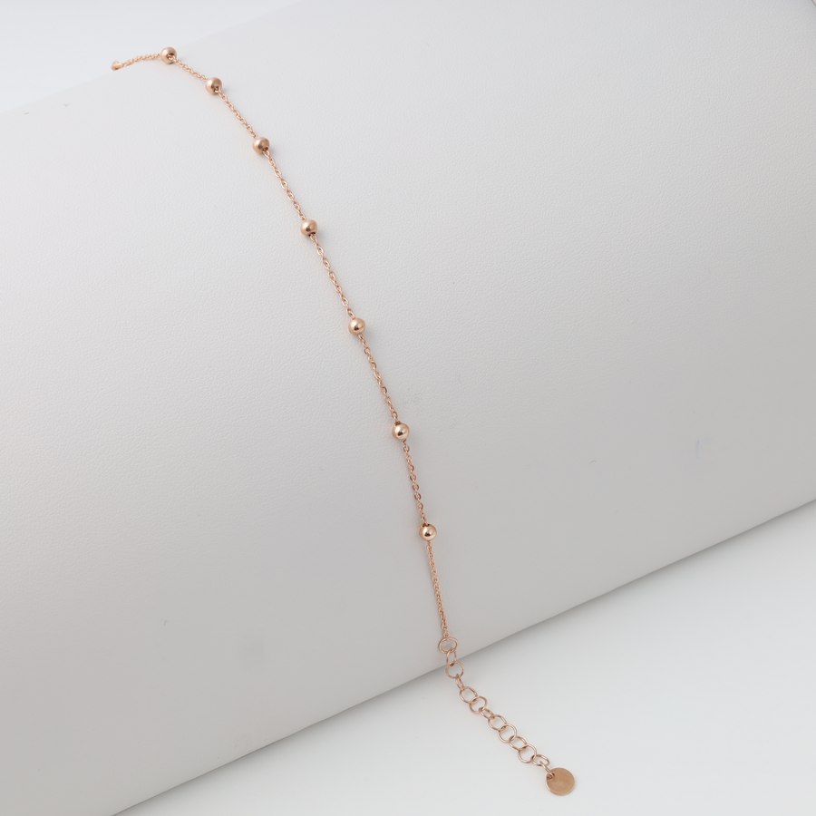 Delicate 14k gold beaded chain bracelet with disc charm on white display, minimalist Ukrainian Jewelry, dainty gold bracelet gift.