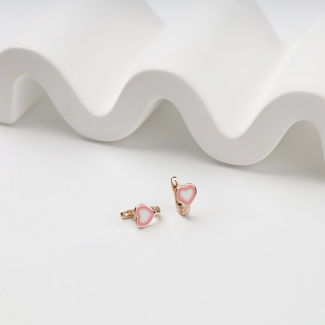 Small rose gold heart earrings with layered pink and white enamel