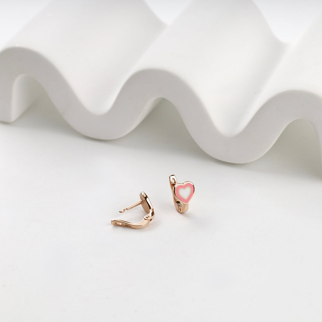 English-lock back opened on one pink heart enamel earring