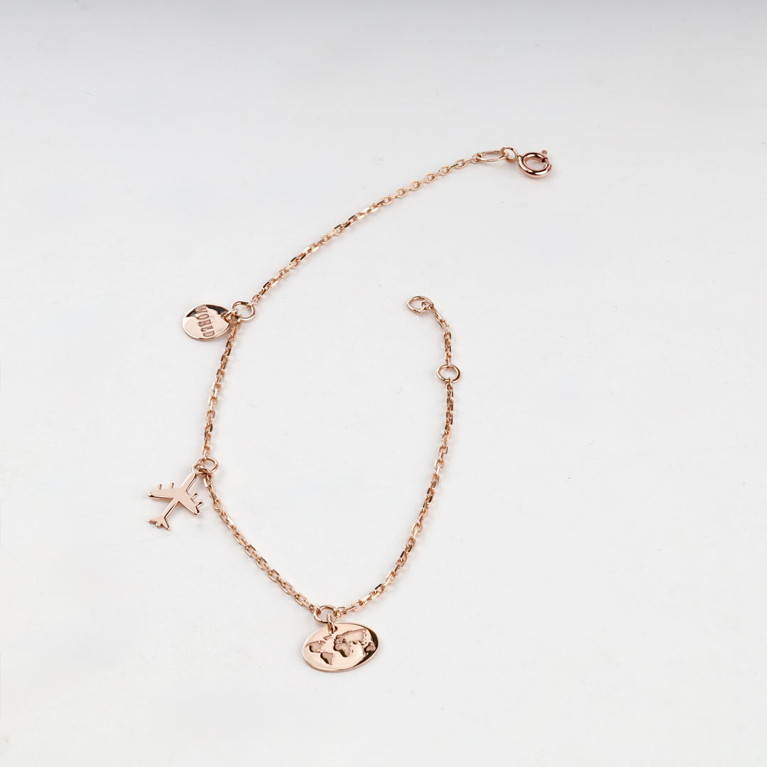 Travel Charm Bracelet | 14K Rose Gold (585) — angled view