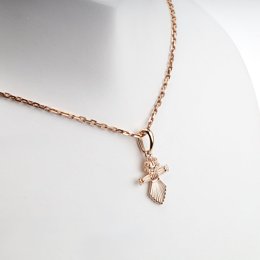 14K rose gold motanka folk-doll pendant, front view