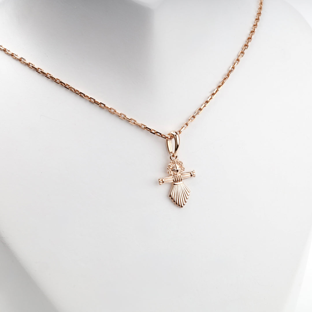 Rose gold motanka pendant, detail of the floral crown and arms