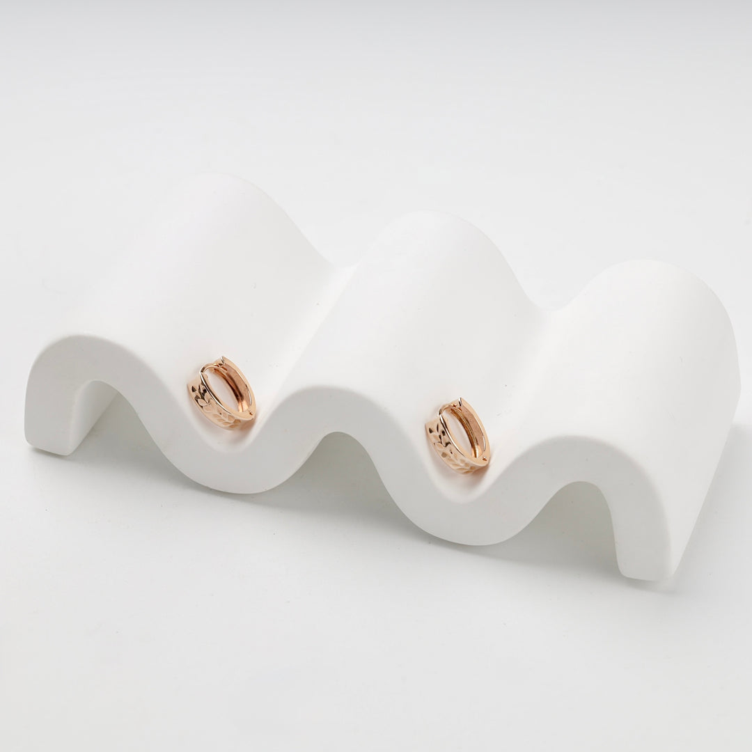 Patterned Huggie Hoop Earrings | 14K Rose Gold (585) — side view