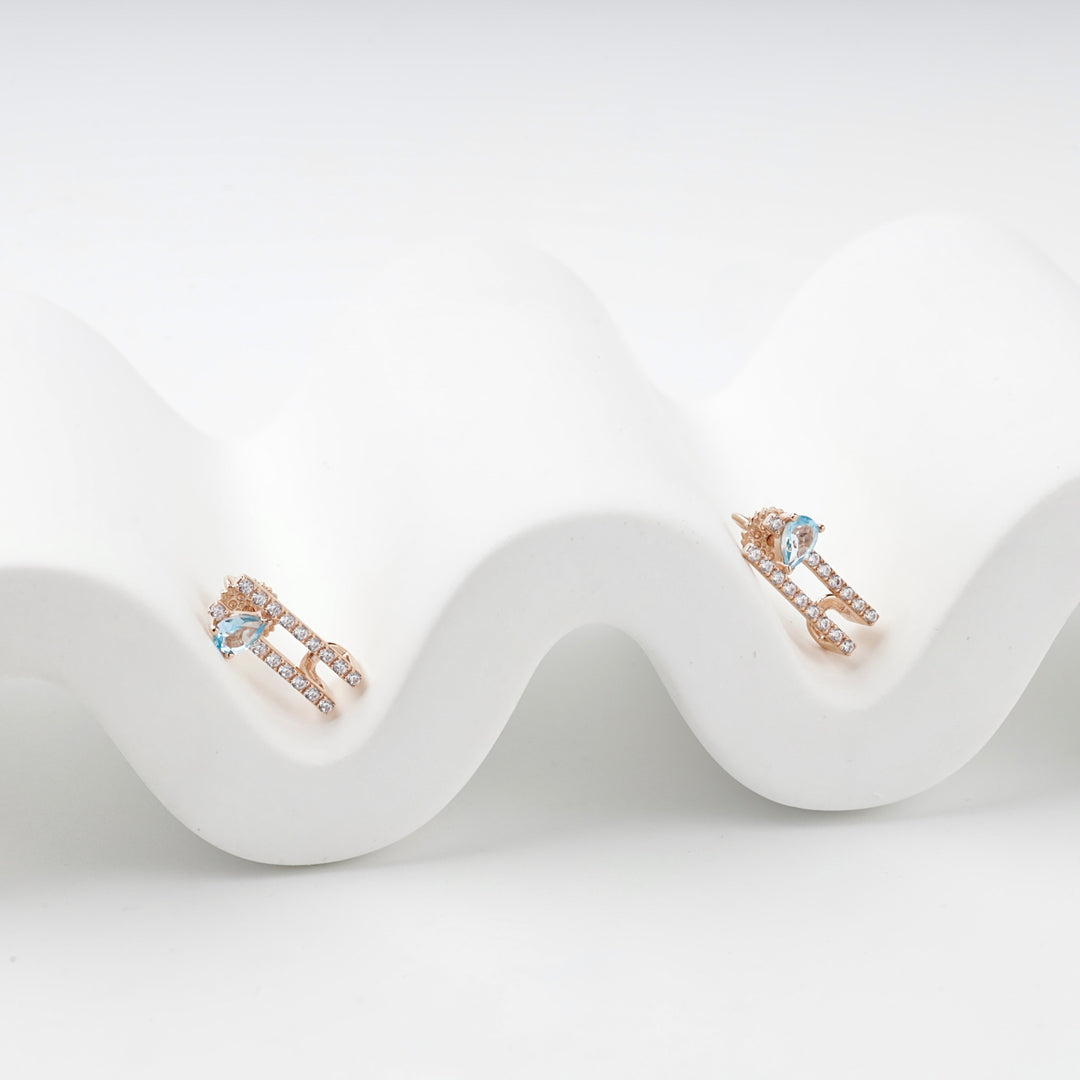 Geometric Stud Earrings with Blue Topaz | 14K Rose Gold (585) — front view