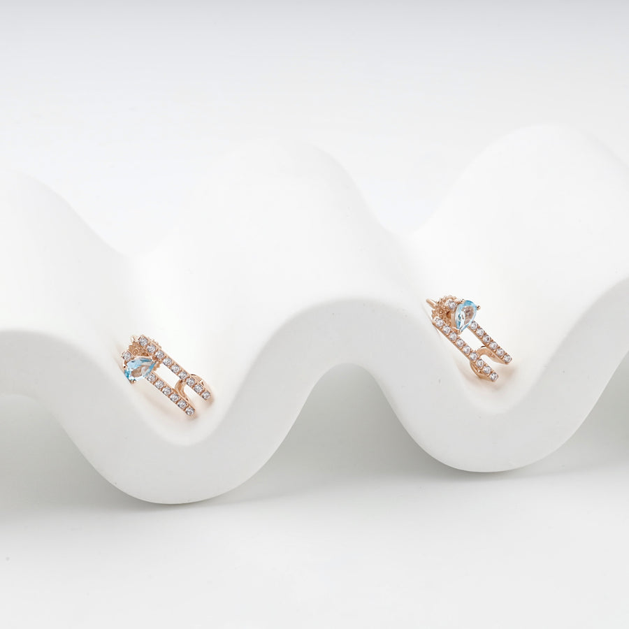 Geometric Stud Earrings with Blue Topaz | 14K Rose Gold (585) — front view
