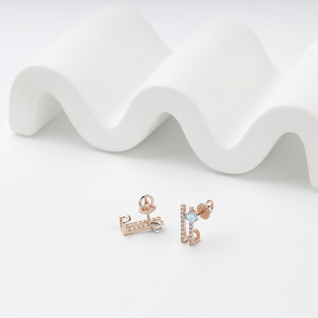 Geometric Stud Earrings with Blue Topaz | 14K Rose Gold (585) — side view
