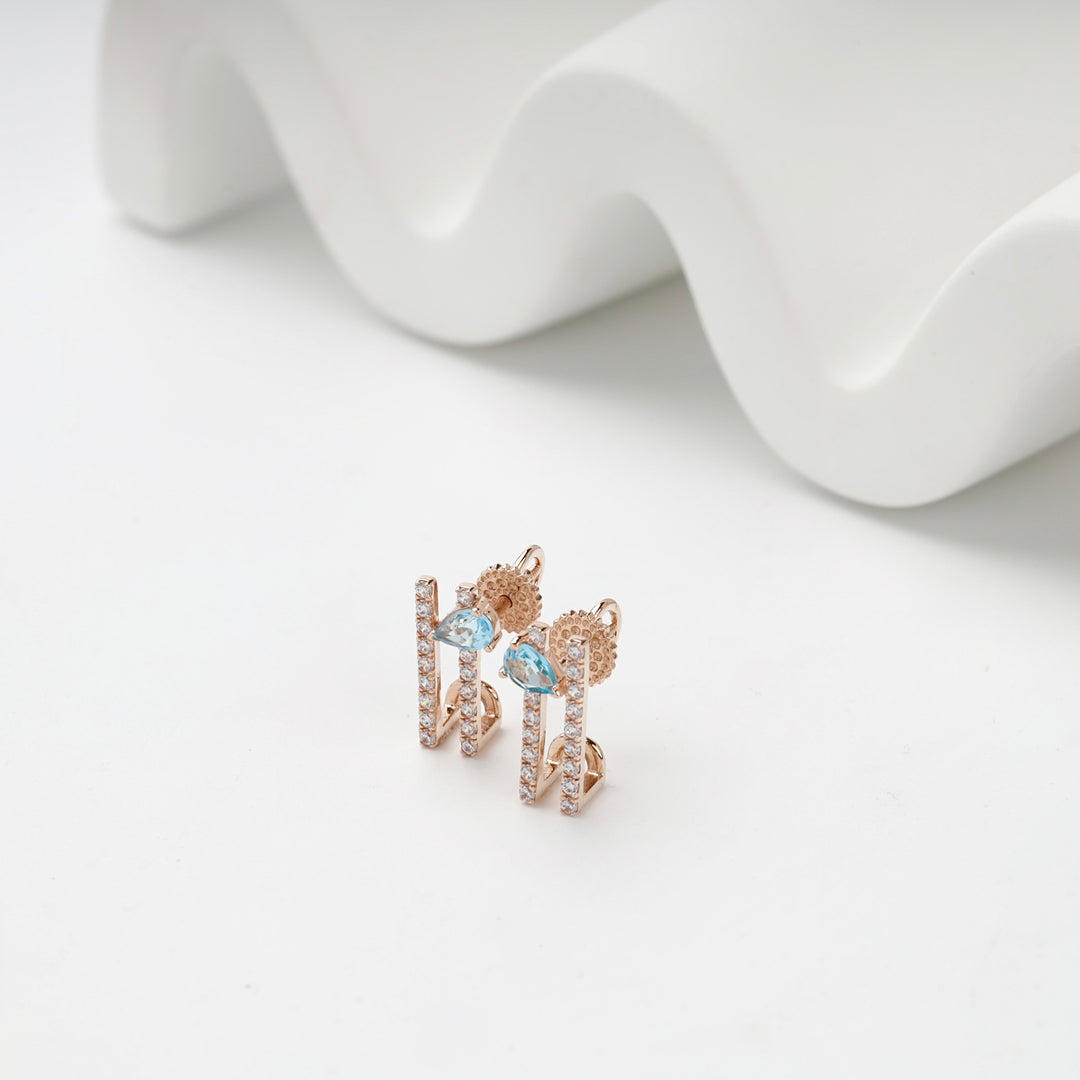 Geometric Stud Earrings with Blue Topaz | 14K Rose Gold (585) — detail view