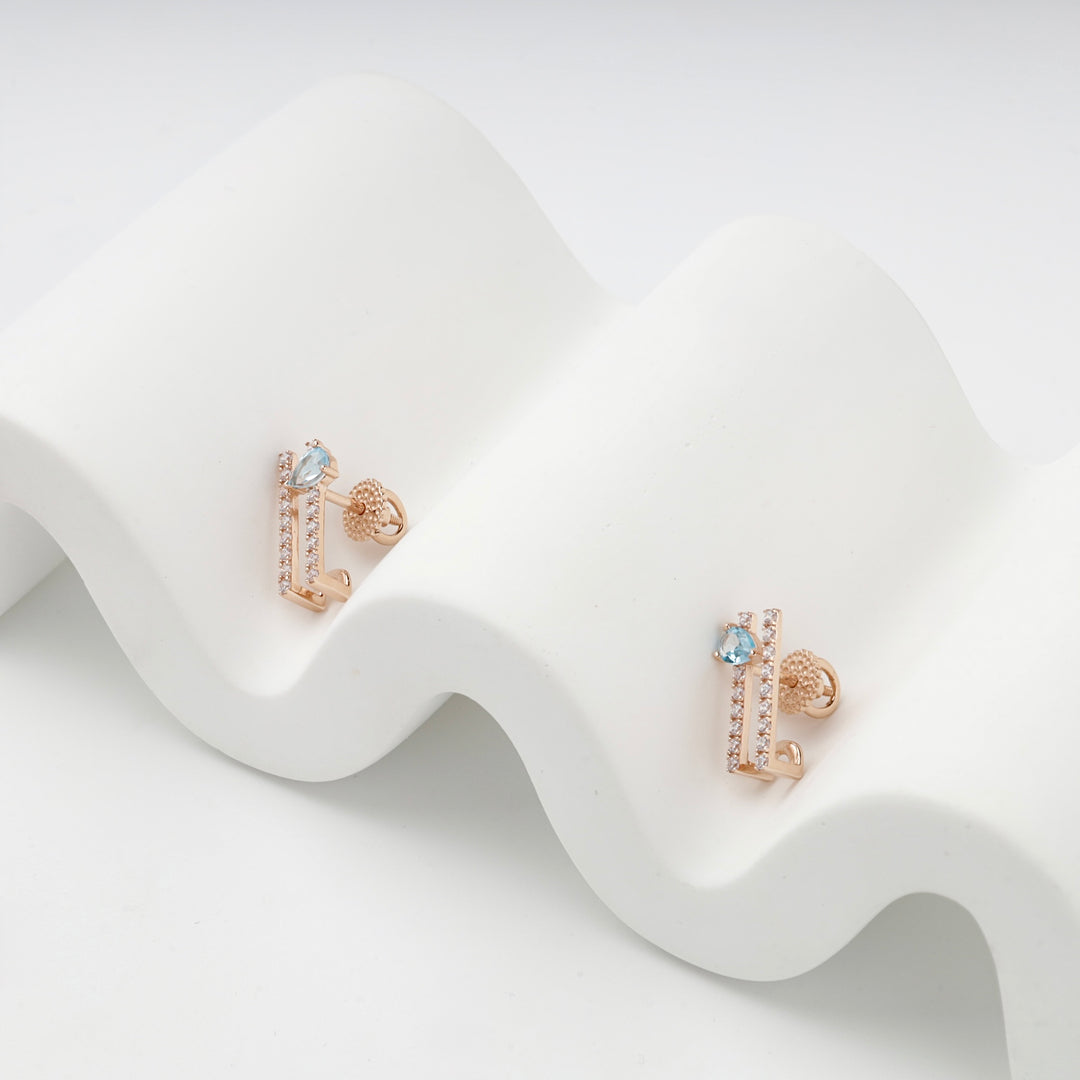 Geometric Stud Earrings with Blue Topaz | 14K Rose Gold (585) — product tag